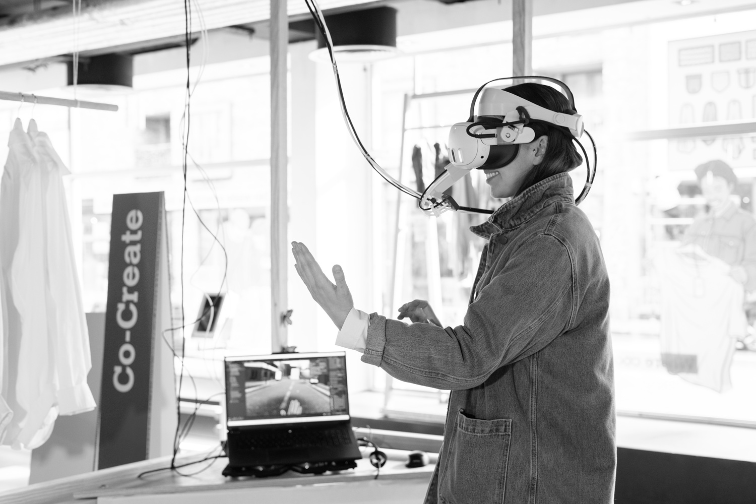 A visitor of the Regenerative Fashion Hub, a public exhibition that was part of the FarFalla project.